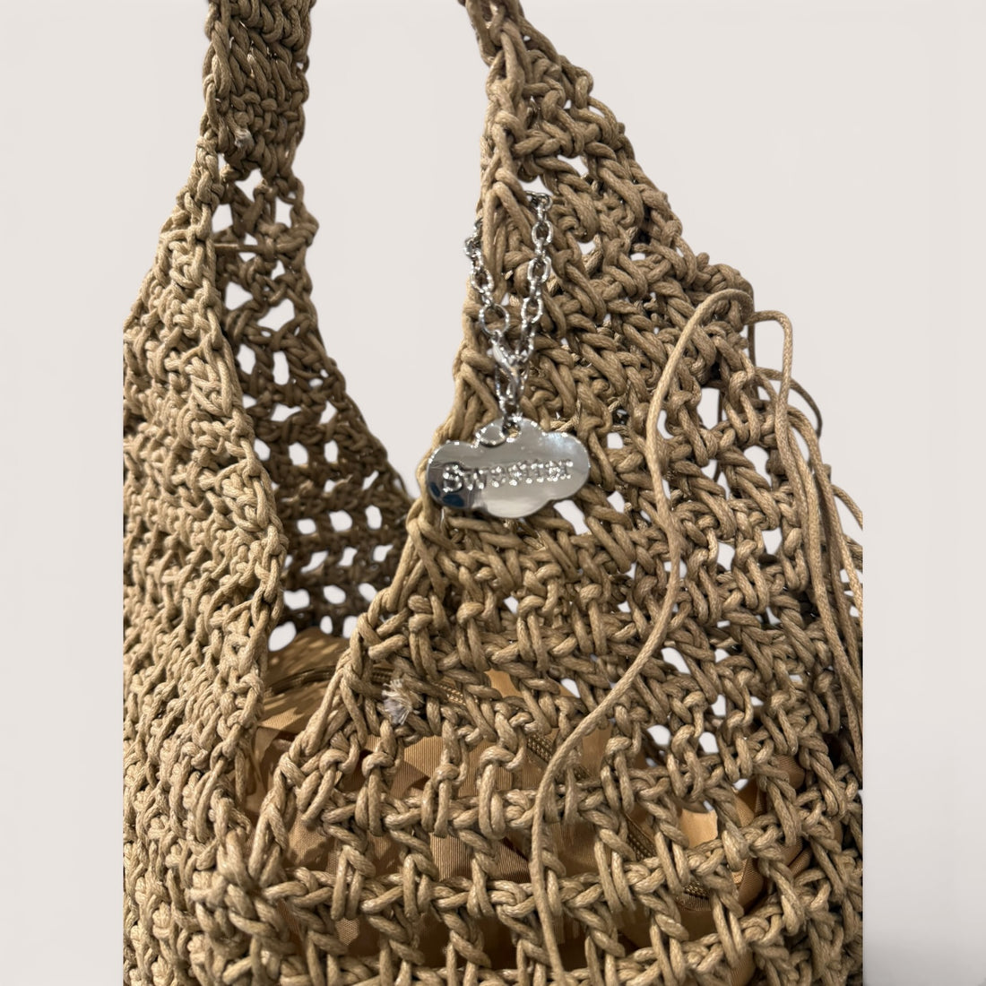 Bolso hobo flecos topo