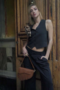 Bolso silla de montar piel camel con doble correa y compartimento interior con cremallera