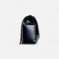 Bolso acolchado maxi clásico negro de piel con cadena y cierre giratorio