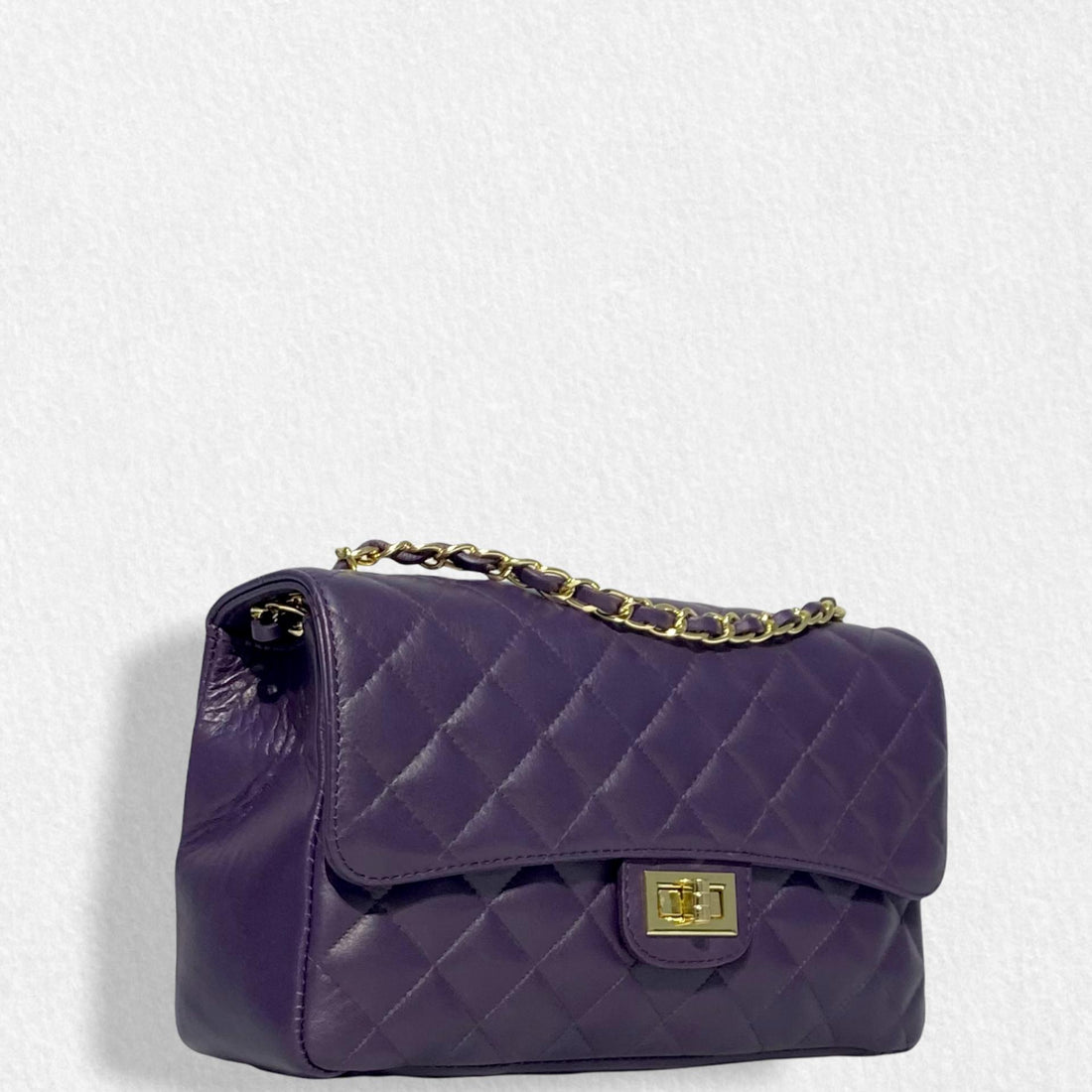 Bolso  clasic morado c dorada
