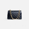 Bolso acolchado maxi clásico negro de piel con cadena y cierre giratorio