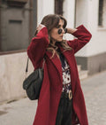 Bolso silla de montar negro en piel con doble correa y herrajes dorados