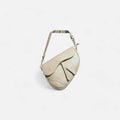 Bolso silla montar piel beige de vacuno con doble correa y compartimento interior con cremallera