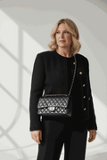 Bolso acolchado negro clásico de piel con cadena dorada, fabricado en Italia